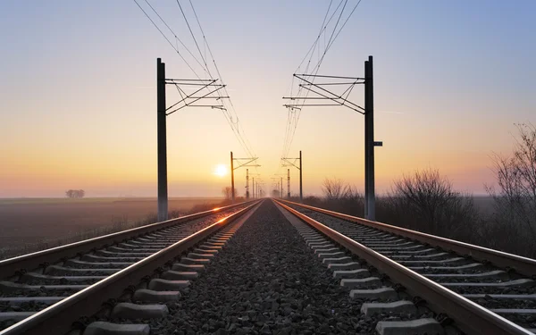 Rrailroad při západu slunce — Stock fotografie