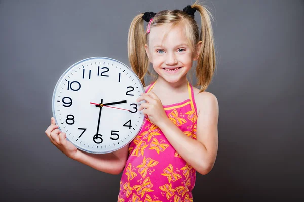 Picture of beautiful girl with big clock — Stock Photo, Image