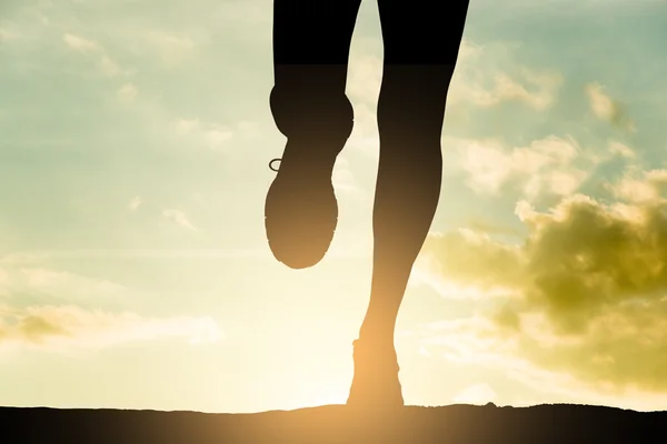 Runner woman silhouette at sunset. Sport shot. — Stock Photo, Image
