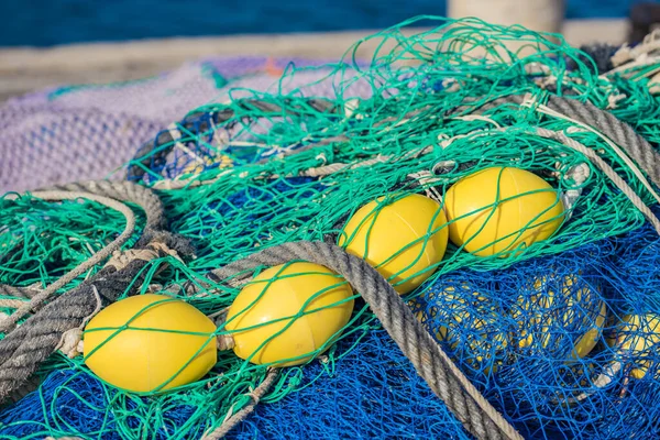 Close-up of commercial fishing net at harbour