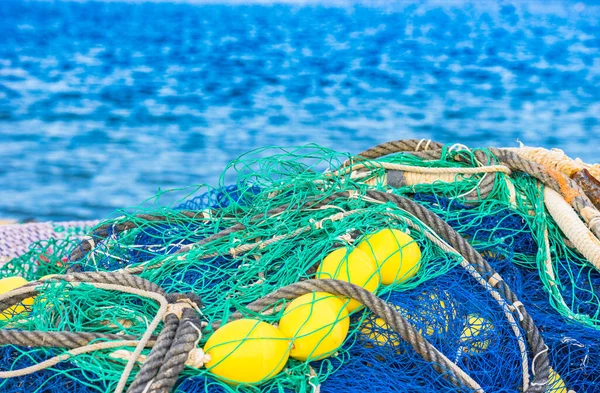 Close-up of commercial fishing net at harbor