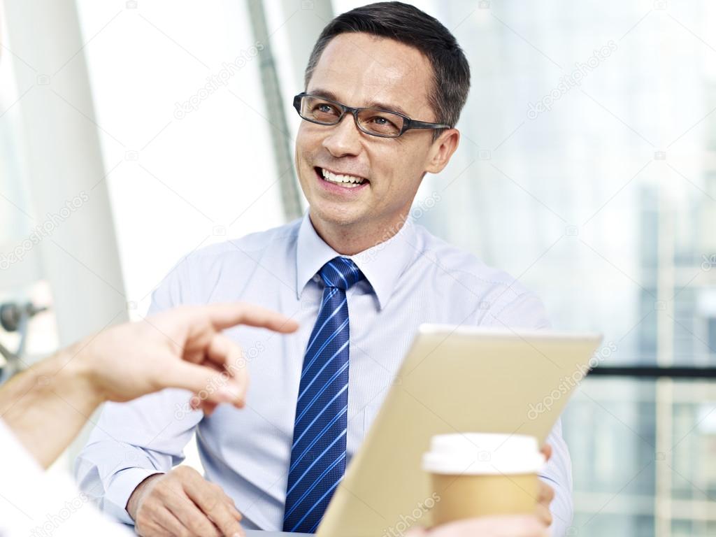 business person talking in office