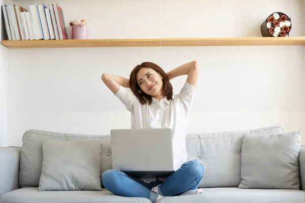 Young Asian Business Woman Working Home Sitting Couch Stretching Arms — Stock Photo, Image