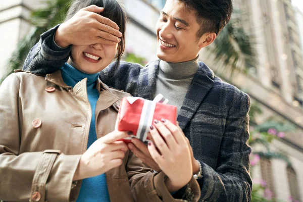 Young Asian Man Give Girlfriend Surprise Gift — Stock Photo, Image