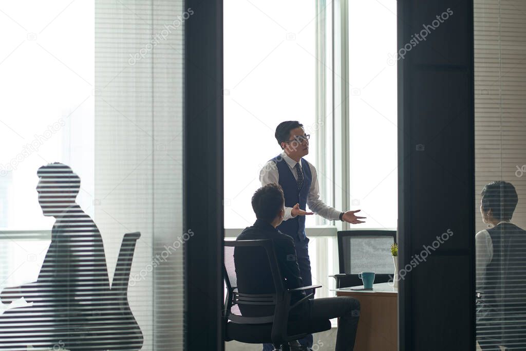 asian business people working meeting in modern office