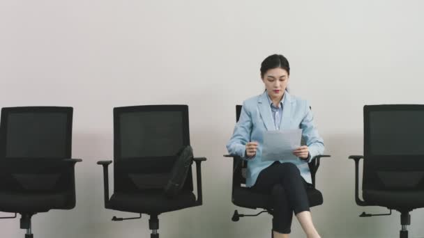 Young Asian Business Woman Job Applicant Anxiously Waiting Interview — Stock Video