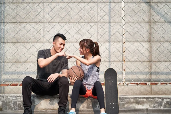 Young Asian Adult Man Woman Bumping Fists Outdoor Basketball Court — Stock Photo, Image