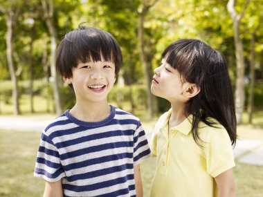 playful asian brother and sister