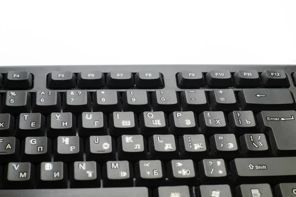 Hátul Megvilágított Billentyűzet Bezárva Fekete Kulcsok Megvilágított Karakterekkel — Stock Fotó