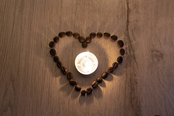 love of coffee, symbol of love, shape of heart from coffee beans