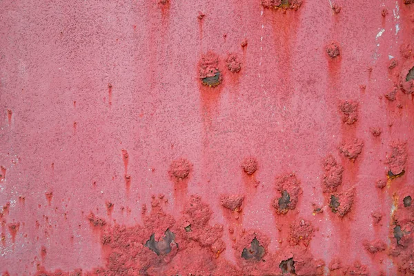 Dark red wall texture for background or wallpaper. Detailed red grunge background. Dark red rusted metal plate texture background.