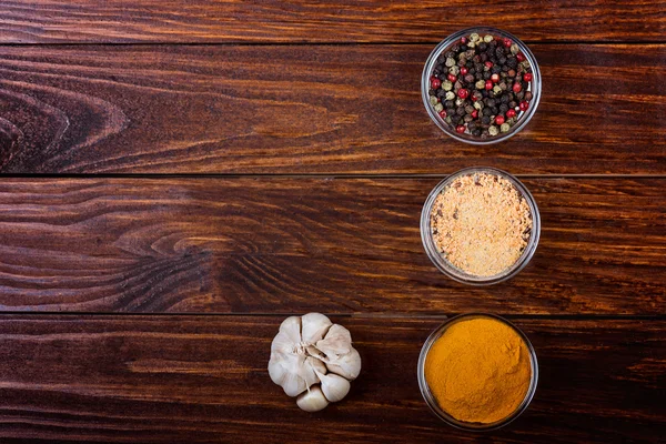 Aromatic spices on wooden background. — Stock Photo, Image