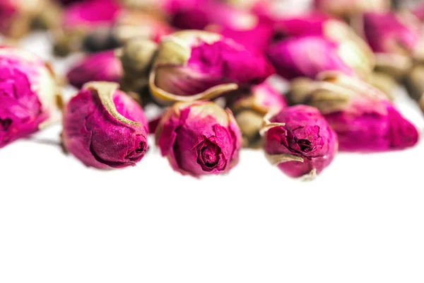 干玫瑰花蕾为背景的特写 — 图库照片