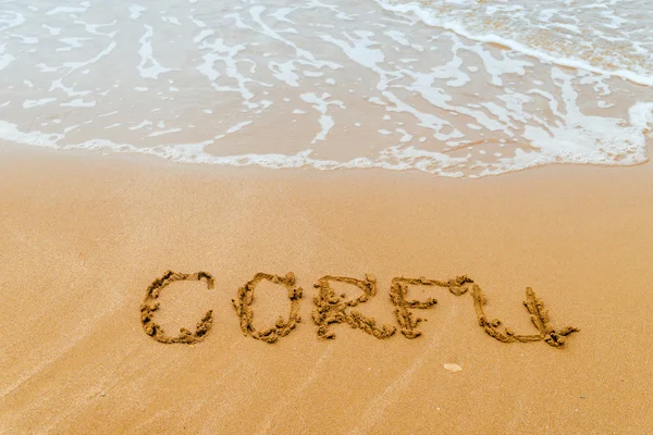 "Corfú "escrito en la playa de oro, Corfú, Grecia . — Foto de Stock