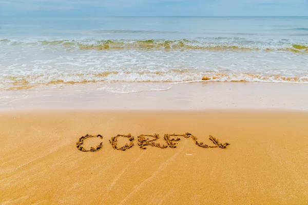 "Corfú "escrito en la playa de oro, Corfú, Grecia . — Foto de Stock