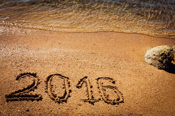 Neujahrskonzept am Meeresstrand. — Stockfoto