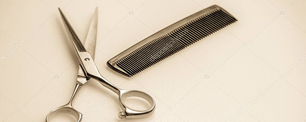 scissors and comb. Professional hairdresser tools, isolated on white
