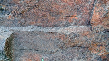 Gri renkli doğal taş yüzey fotoğrafı. Taş arkaplan.
