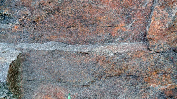 Gri renkli doğal taş yüzey fotoğrafı. Taş arkaplan.