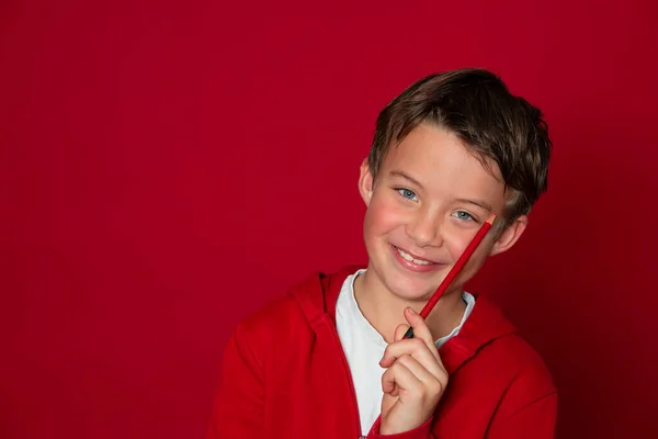 Cool Young School Boy Posing Red Pencil Ront Red Background — Stock Photo, Image