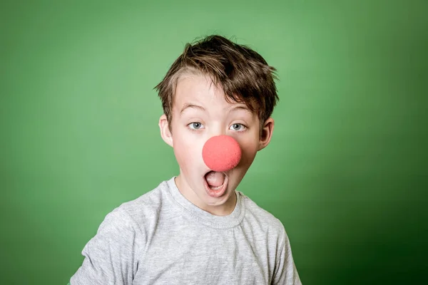 Cool Cute Schoolboy Green Hand Plaster Red Clown Nose Posing — Stock Photo, Image