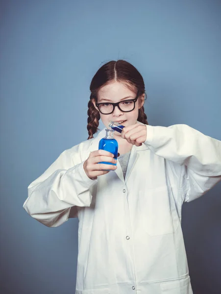 Pretty Girl Two Braids Dressed Scientist Experimenting Blue Liquids Wearing — Stock Photo, Image
