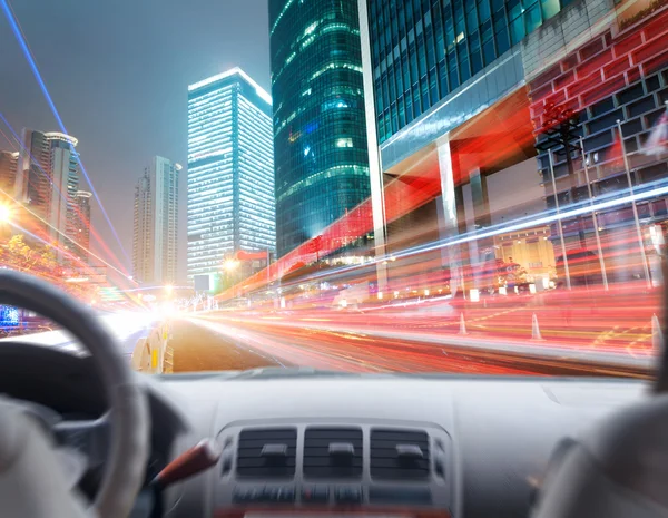 Driver's hands on steering wheel of car — Stock Photo, Image