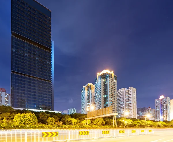 Light trails on street at dusk — Stock Photo, Image