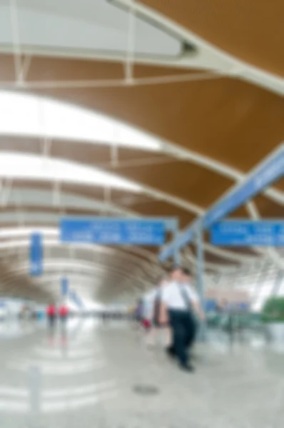 Blurred people in airport — Stock Photo, Image