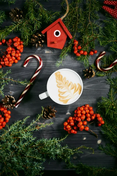 Cup of coffee on wooden christmas background — Stock Photo, Image