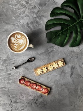 coffee on concrete and flower