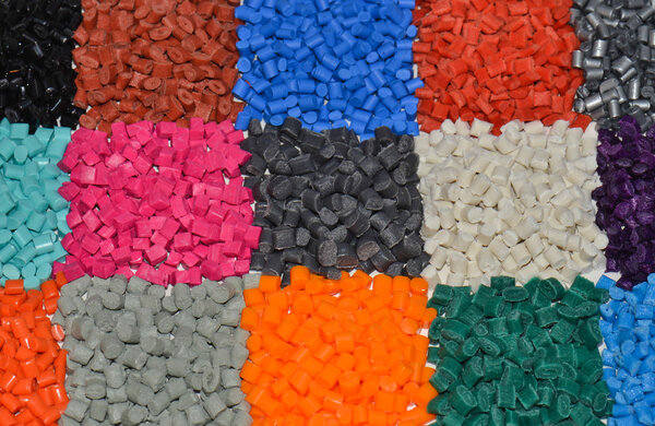 Dyed plastic polymer granulates in laboratory