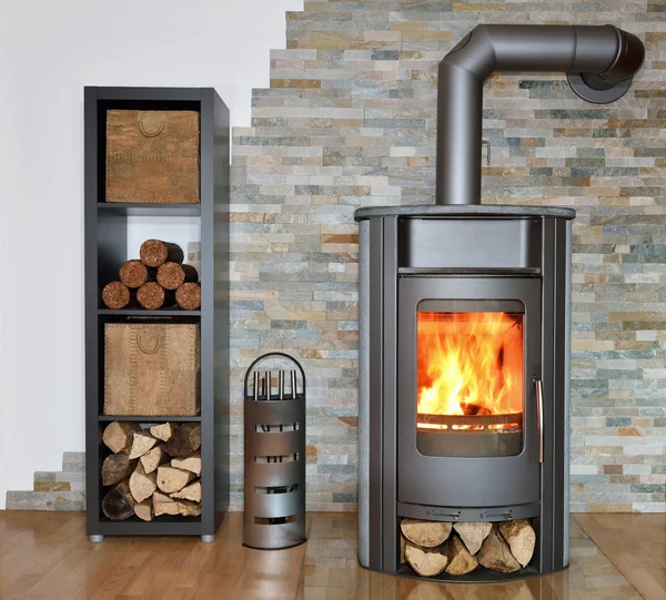 Wood fired stove with fire-wood — Stock Photo, Image