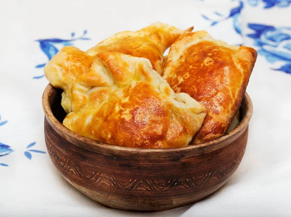 Pastries in a ceramic bowl — Stock Photo, Image