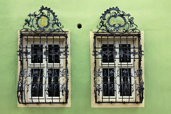 Windows with a beautiful curved black metal lattices, Germany — Stock Photo, Image