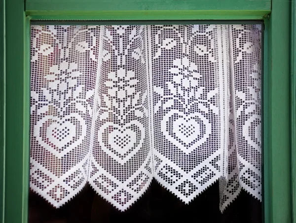 Lace curtain with a hearts — Stock Photo, Image