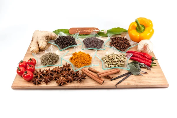 Different Spices on an wooden board — Stock Photo, Image