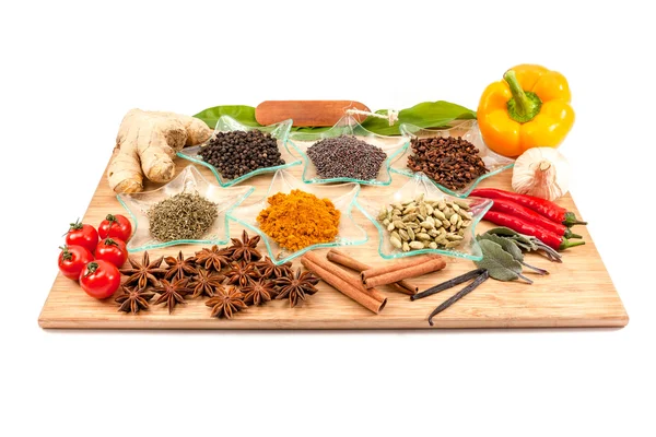 Different Spices on an wooden board — Stock Photo, Image