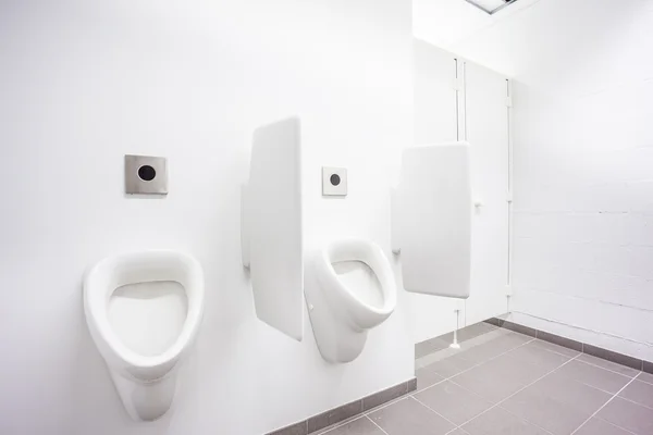 Urinoir en toilet deuren — Stockfoto