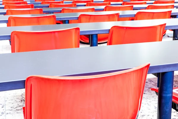 An auditoriumwhit red chairs — Stock Photo, Image