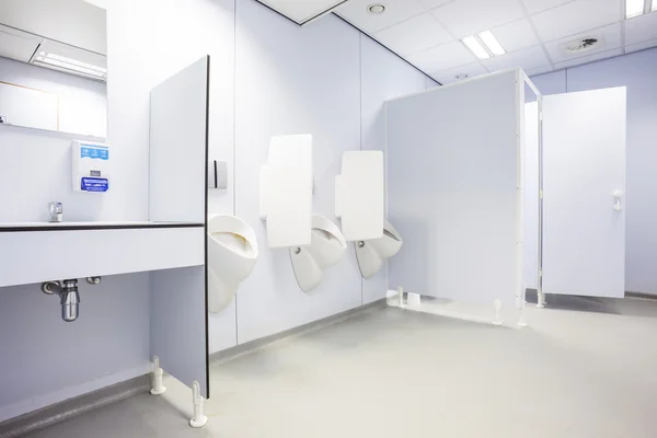 Urinoir en toilet deuren — Stockfoto