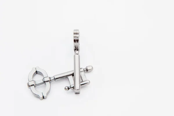 Metal puzzle key — Stock Photo, Image