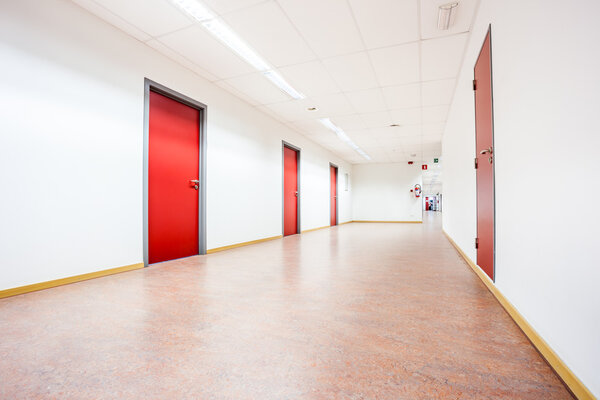 corridor whit red doors