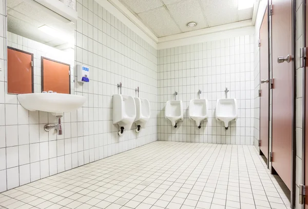 Urinal and sink — Stock Photo, Image