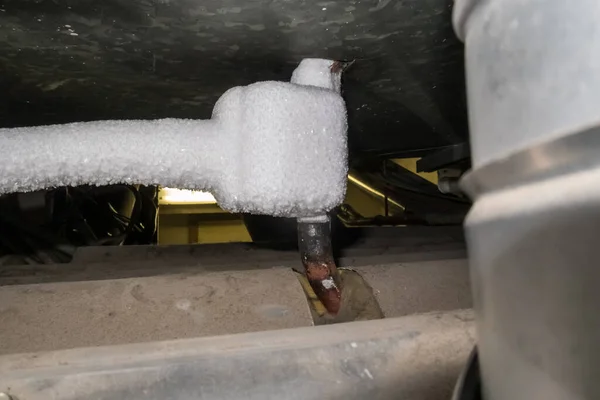 heating pipes are frozen with a freezer to work on the pipes
