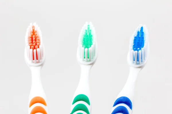 Üç toothbrushs — Stok fotoğraf