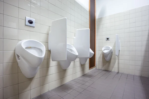 Urinal on the wall — Stock Photo, Image