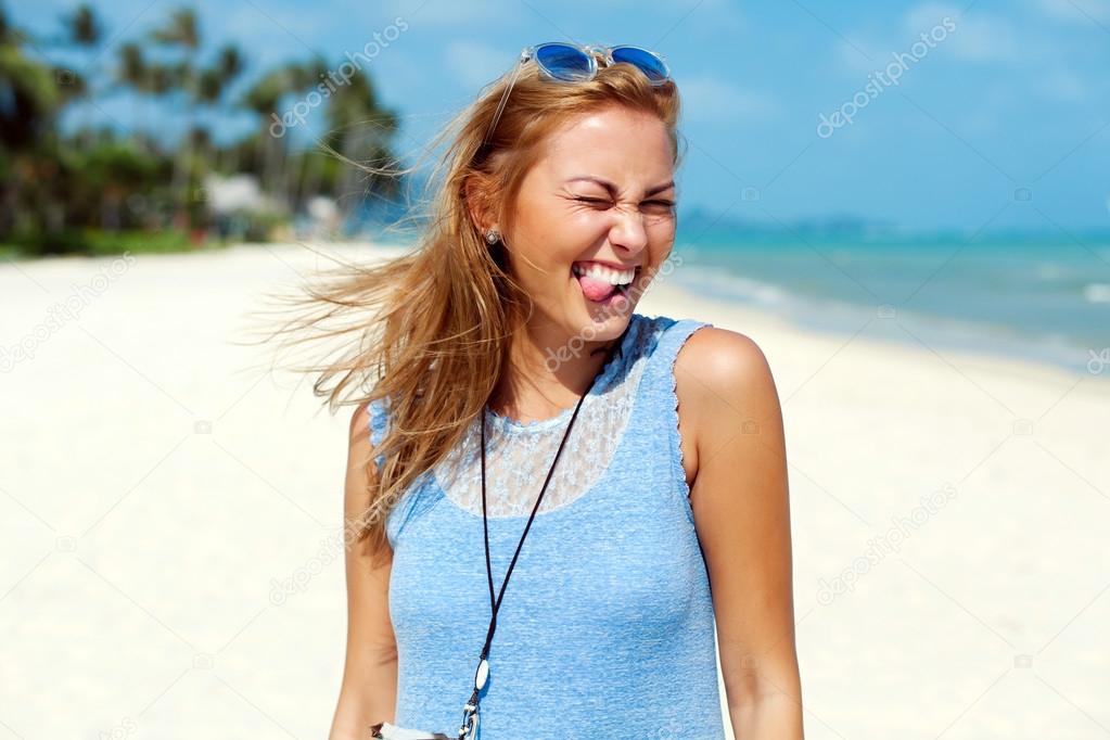 woman showing tongue and having fun