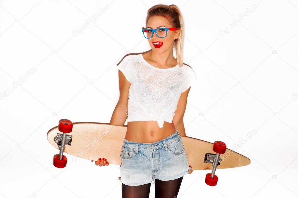 stylish hipster woman with longboard