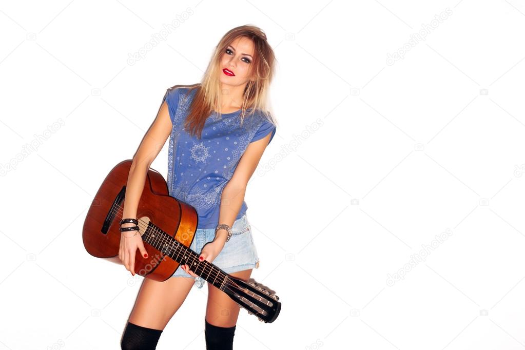 dancing happy musician woman with guitar